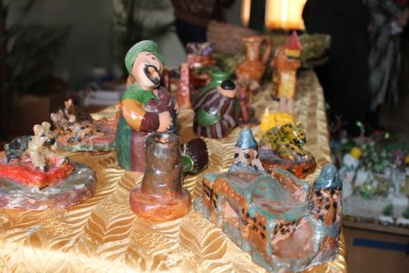 Кӯмаки низомиёни Амрико ба маъюбони тоҷик (АКС)