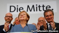 Пирӯзии ҳизби Меркел дар интихоботи порлумонии Олмон
